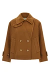 the chloé short coat redefines the codes of outerwear through a boxy silhouette