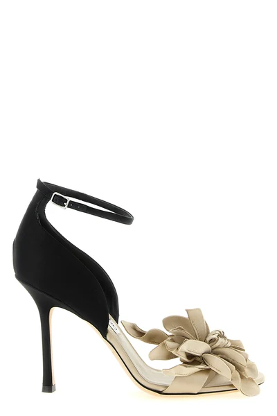 jimmy choos coko sandals define a bold silhouette through a sharp chromatic c