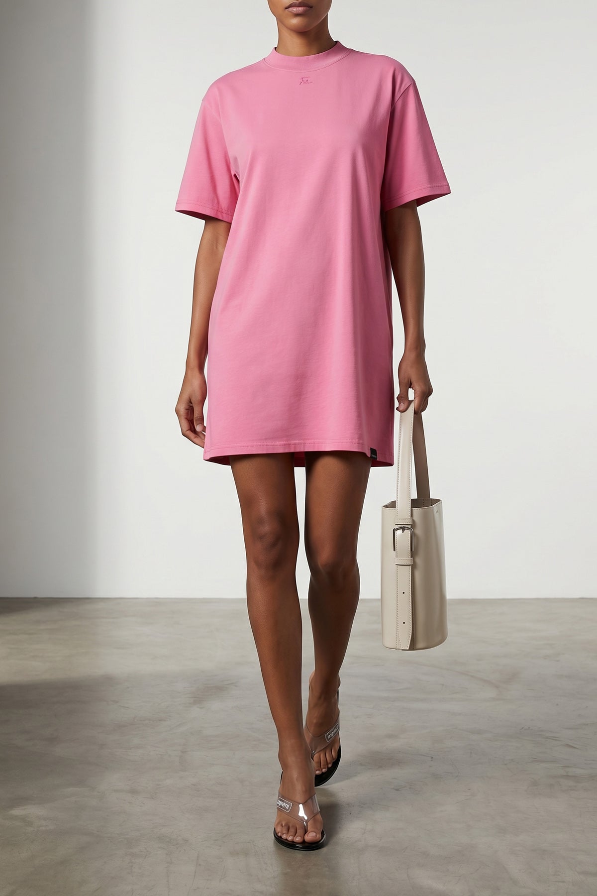 COPERNI OS ergonomic bucket bag in smooth abrasive finish leather
