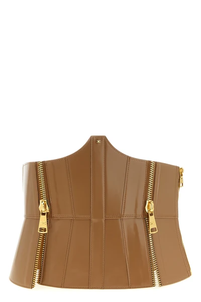 the elisabetta franchi corset belt defines the silhouette through a rigorous con