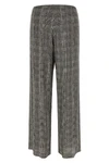 ermanno scervino trousers redefine contemporary elegance through a wide-leg silh