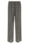 ermanno scervino trousers redefine contemporary elegance through a wide-leg silh