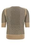 the ermanno scervino short-sleeved sweater stands out for its sophisticated knit
