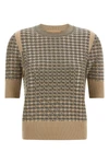 the ermanno scervino short-sleeved sweater stands out for its sophisticated knit