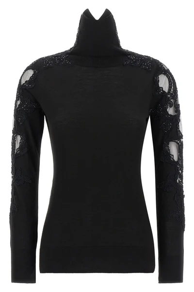the ermanno scervino high neck sweater in pure black virgin wool stands out for