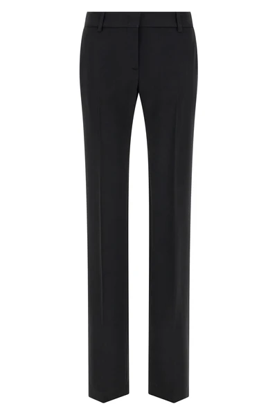 ermanno scervino pants define a new standard of sartorial rigor through a straig