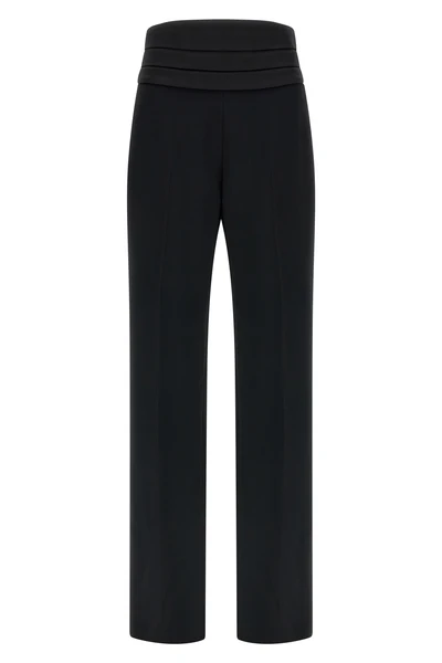 the tuxedo-inspired trousers by ermanno scervino define a slender silhouette thr