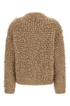 the peserico bomber jacket redefines the codes of knitwear through material volu