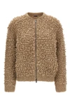 the peserico bomber jacket redefines the codes of knitwear through material volu