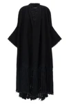 the dolce & gabbana bouclé cape stands out for its large volume