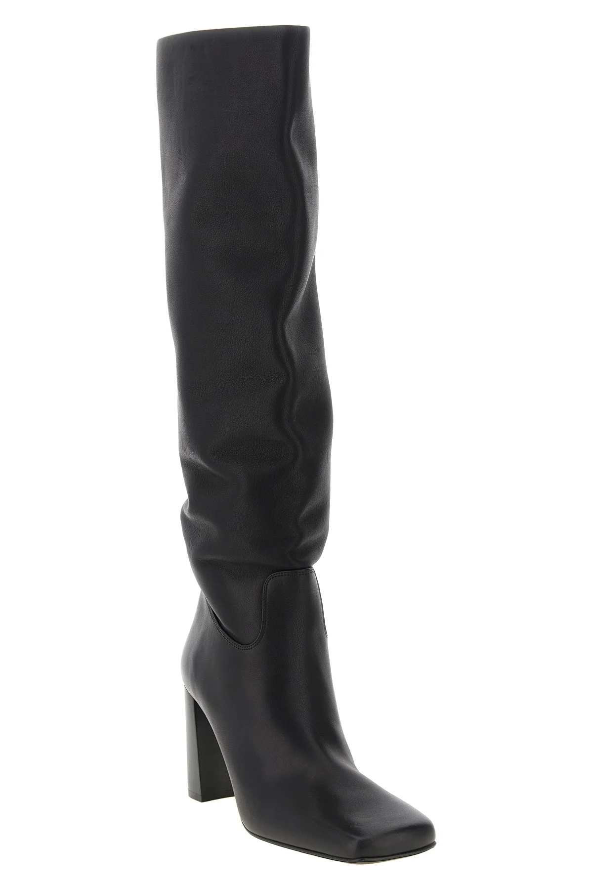KHAITE 37 the khaite petra boot redefines vertical elegance through a rigorous silhouett