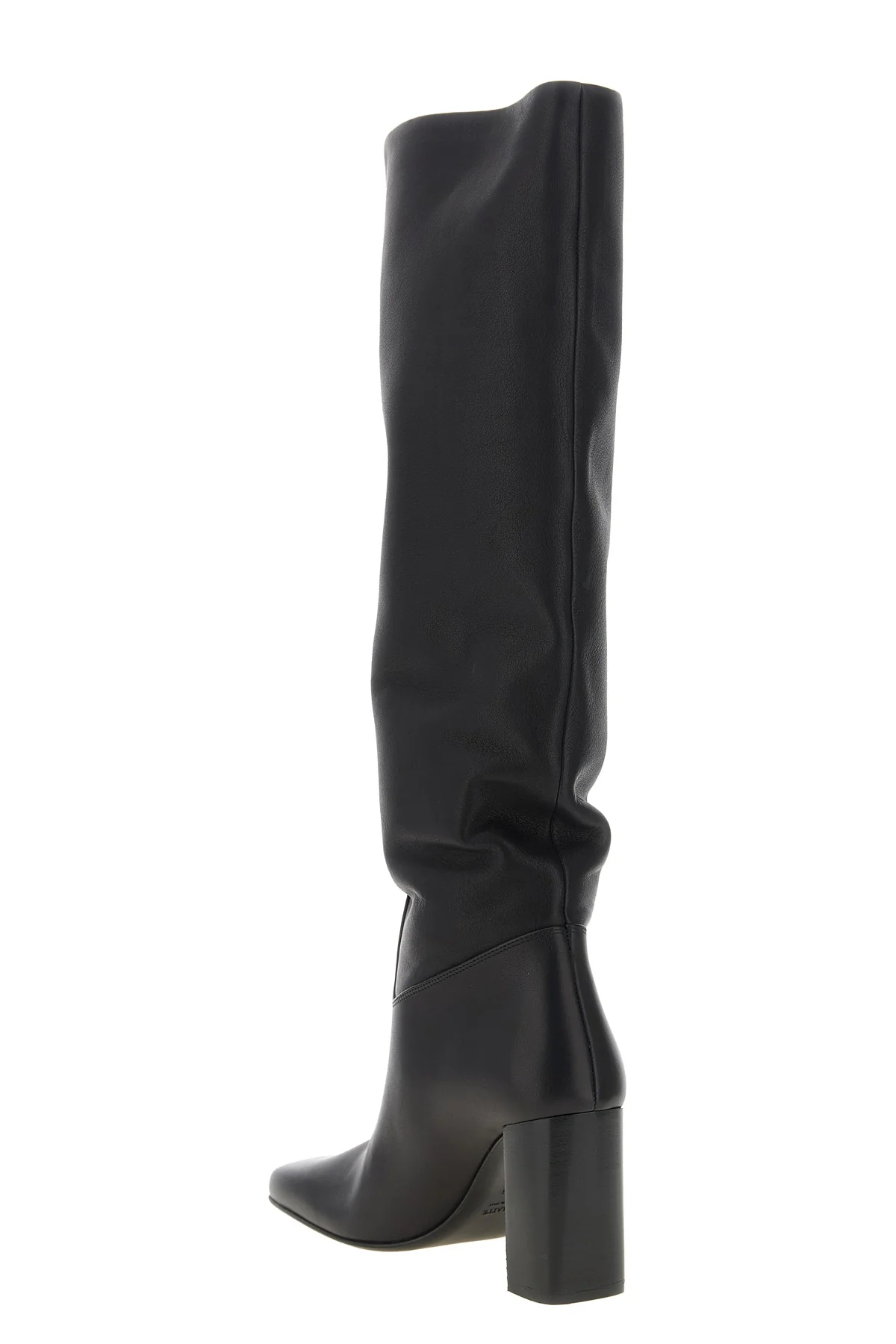 the khaite petra boot redefines vertical elegance through a rigorous silhouett