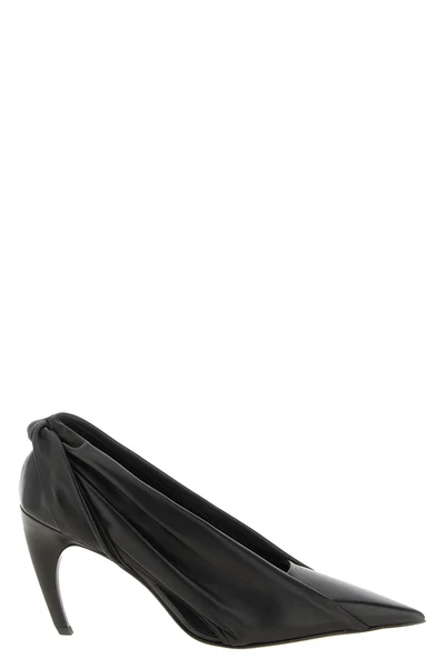 the khaite eve pumps redefine the codes of contemporary elegance through a scu
