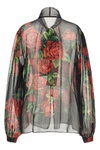 the dolce&gabbana blouse embodies the essence of femininity through impeccable s