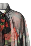 the dolce&gabbana blouse embodies the essence of femininity through impeccable s