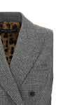 the dolce&gabbana vest defines a new concept of tailoring through a structured a