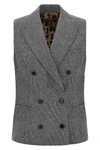 the dolce&gabbana vest defines a new concept of tailoring through a structured a
