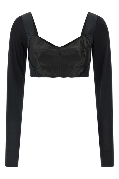 the dolcegabbana black bustier top defines a new concept of tailoring through a