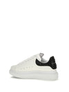 oversized sneakers with suede heel and crystal details