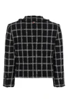 the thom browne cardigan jacket reinterprets the codes of tailoring through a cr