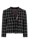 the thom browne cardigan jacket reinterprets the codes of tailoring through a cr