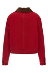 the ami paris jacket defines a cropped silhouette through a rigorous ruby red co