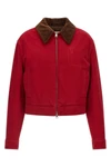 the ami paris jacket defines a cropped silhouette through a rigorous ruby red co