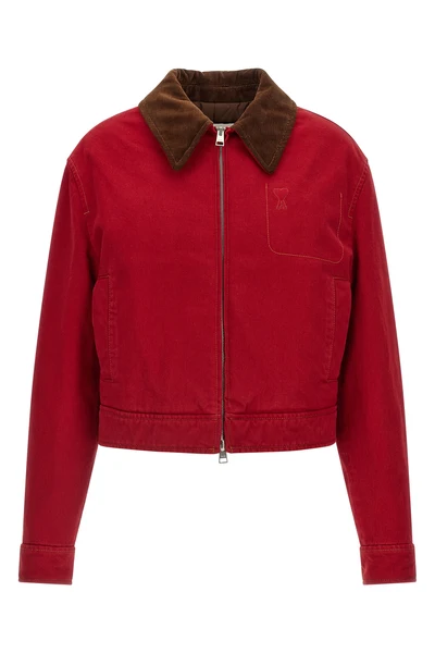 the ami paris jacket defines a cropped silhouette through a rigorous ruby red co