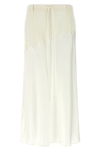 the misenithe rita rose midi skirt redefines the codes of contemporary tailori