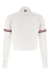 the thom browne cropped shirt reinterprets the codes of classic tailoring throug