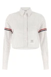 the thom browne cropped shirt reinterprets the codes of classic tailoring throug