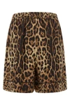 dolce&gabbana silk satin shorts redefine summer clothing through a luxurious sar