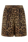 dolce&gabbana silk satin shorts redefine summer clothing through a luxurious sar