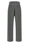 dolce&gabbana tailored trousers redefine the codes of formal elegance through im