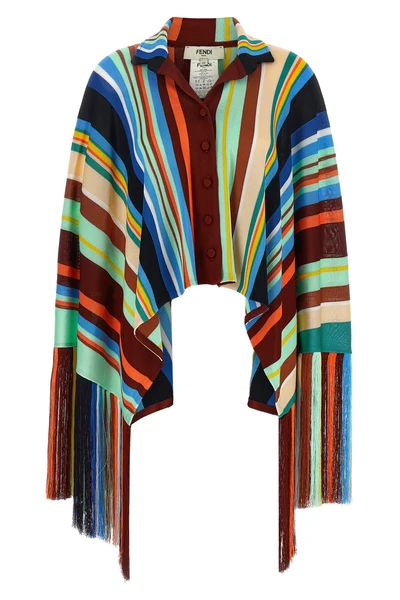 the fendi striped knit poncho features a fluid model