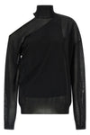 the fendi black jersey redefines the codes of knitwear through a sophisticated p