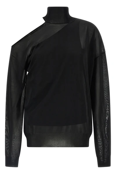 the fendi black jersey redefines the codes of knitwear through a sophisticated p