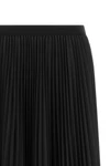 the fabiana filippi skirt defines a new elegance through fluid volumes and mater
