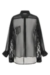 the comme des garçons black shirt redefines the codes of contemporary tailoring