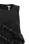 the comme des garçons mini dress redefines volumes through an avant-garde archit