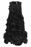 the comme des garçons mini dress redefines volumes through an avant-garde archit