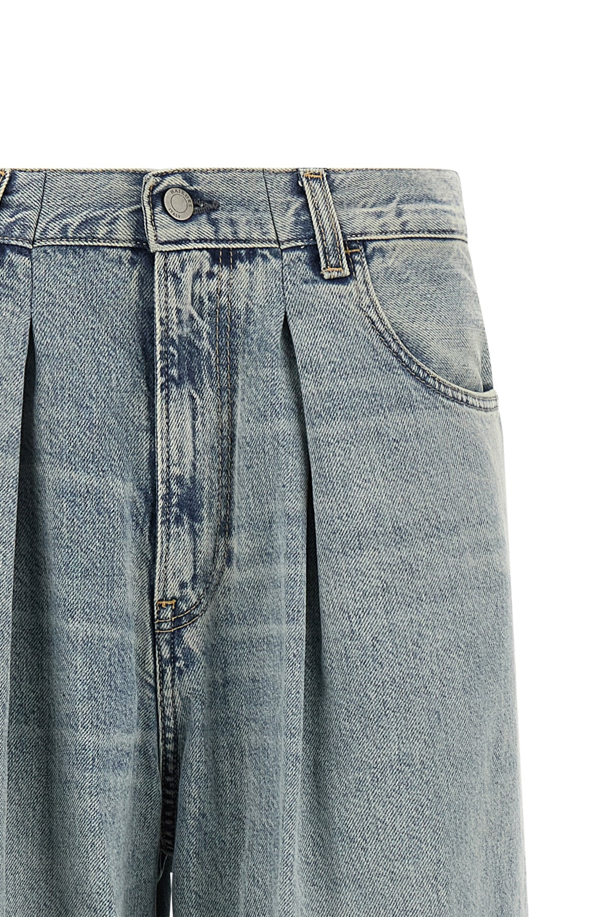 candy haikure jeans redefine denim aesthetics through large volumes and structur
