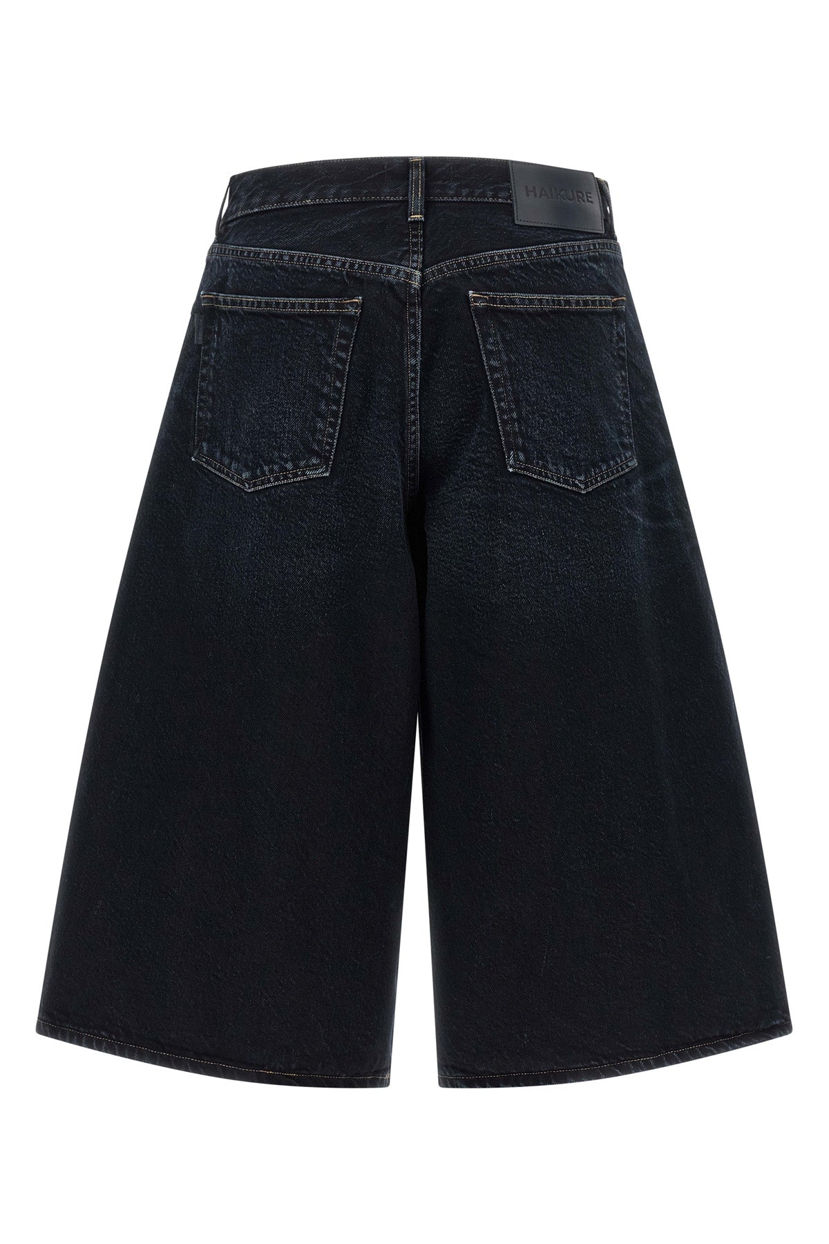 HAIKURE 24 haikure legacy denim bermuda shorts redefine the volumes of the contemporary w