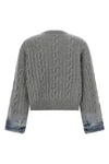 the karine pollock haikure knit redefines traditional knitwear through a bold