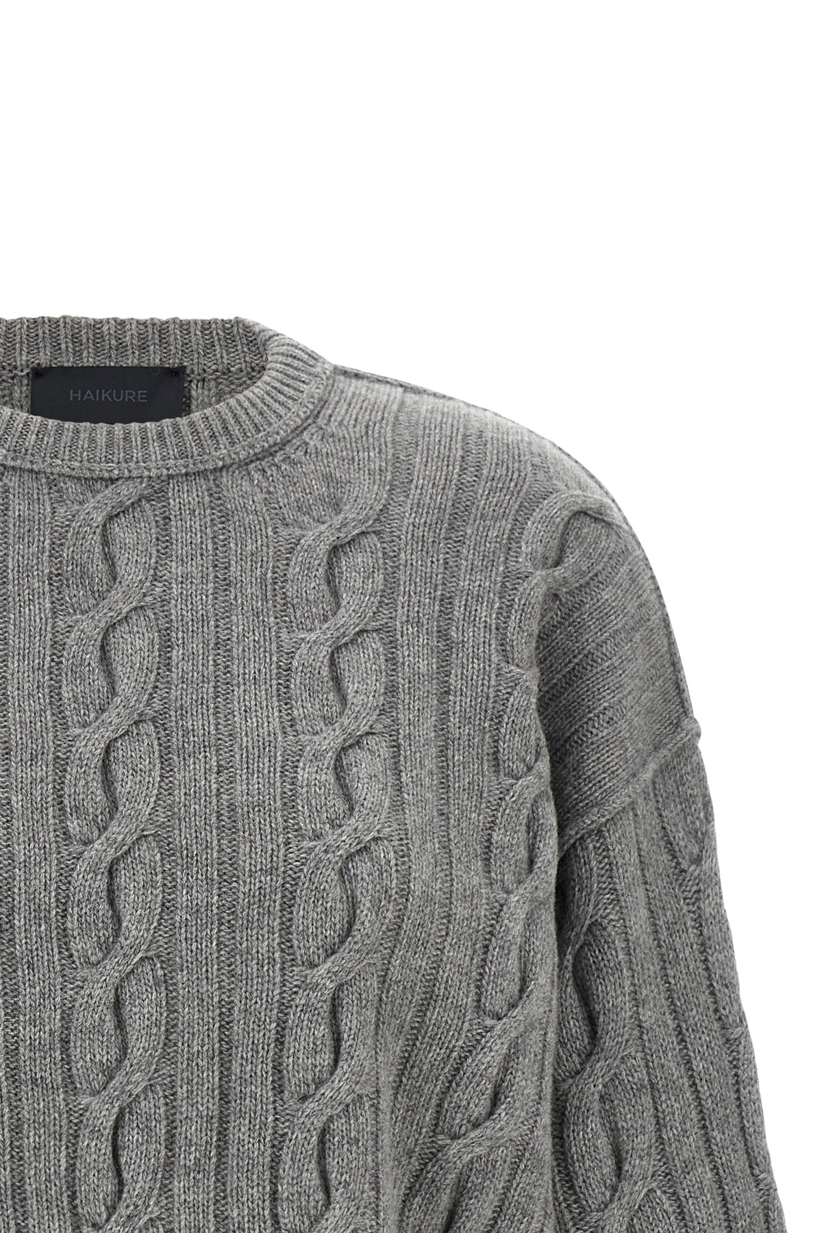 the karine pollock haikure knit redefines traditional knitwear through a bold
