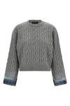 the karine pollock haikure knit redefines traditional knitwear through a bold