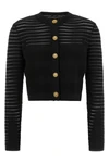 the cardigan balmain defines a new concept of structured elegance
