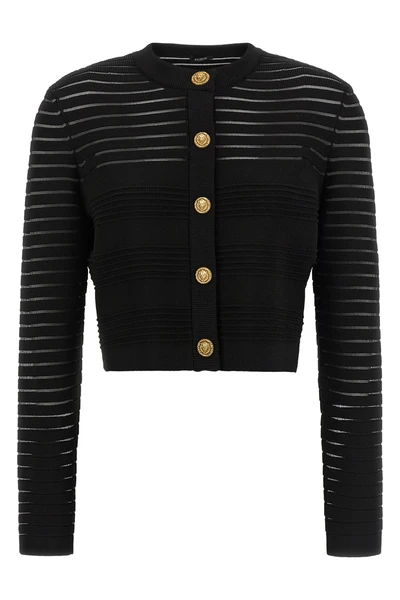 the cardigan balmain defines a new concept of structured elegance