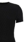 the flared balmain skater dress redefines knitwear codes through an hourglass