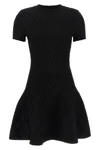 the flared balmain skater dress redefines knitwear codes through an hourglass